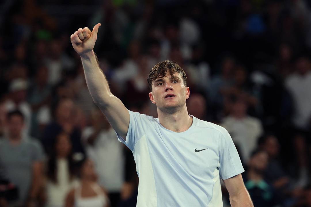 Jack Draper gives a thumbs up to the crowd after beating Thanasi Kokkinakis in the second round of the Australian Open