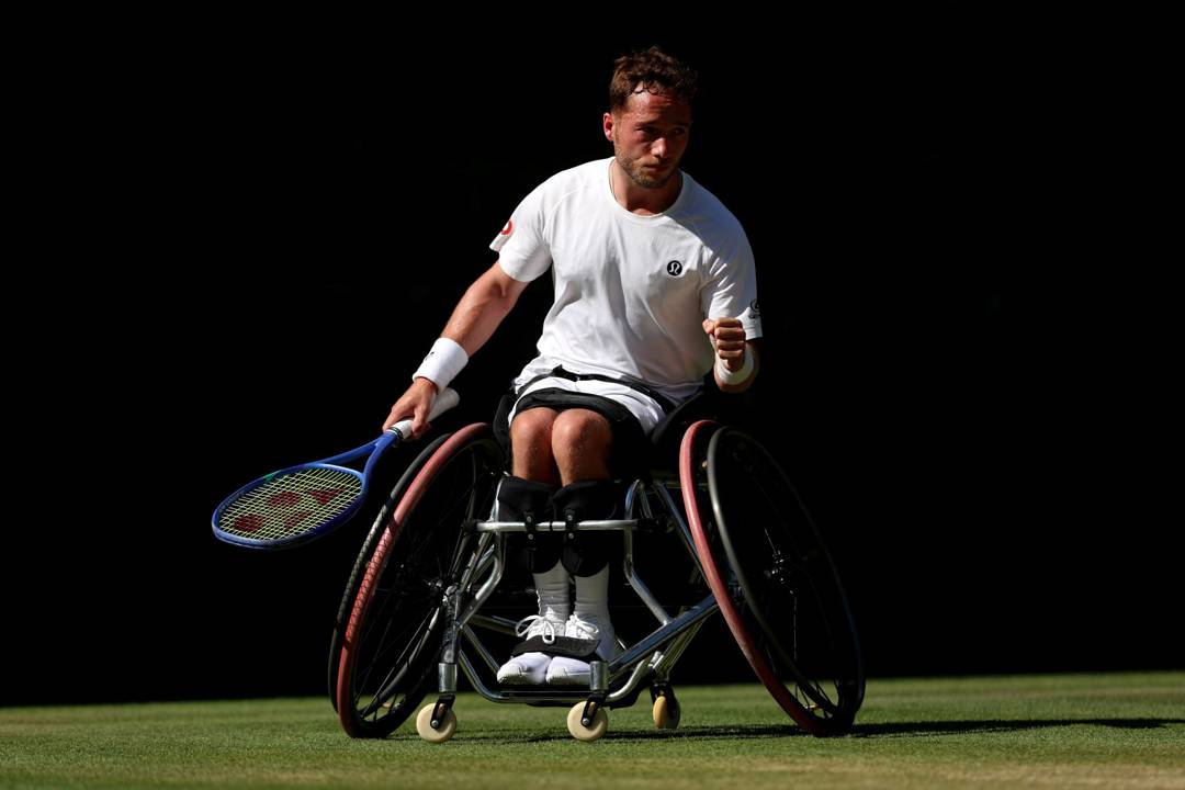 Alfie Hewett pumps his fish in celebration on the grass court