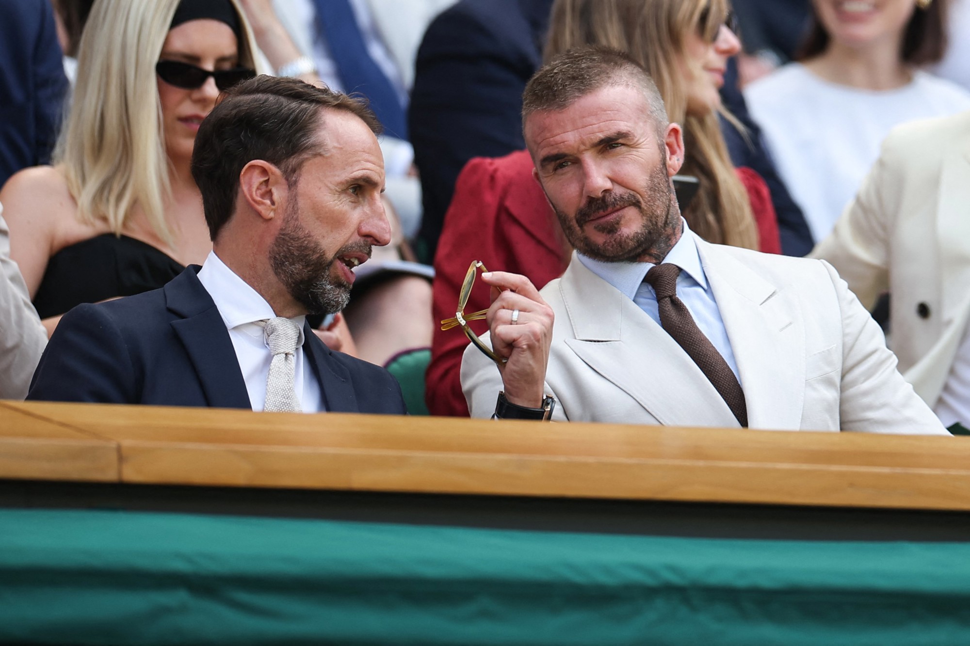 Former England Manager Gareth Southgate chatting with David Beckham in the Royal Box on Centre Court
