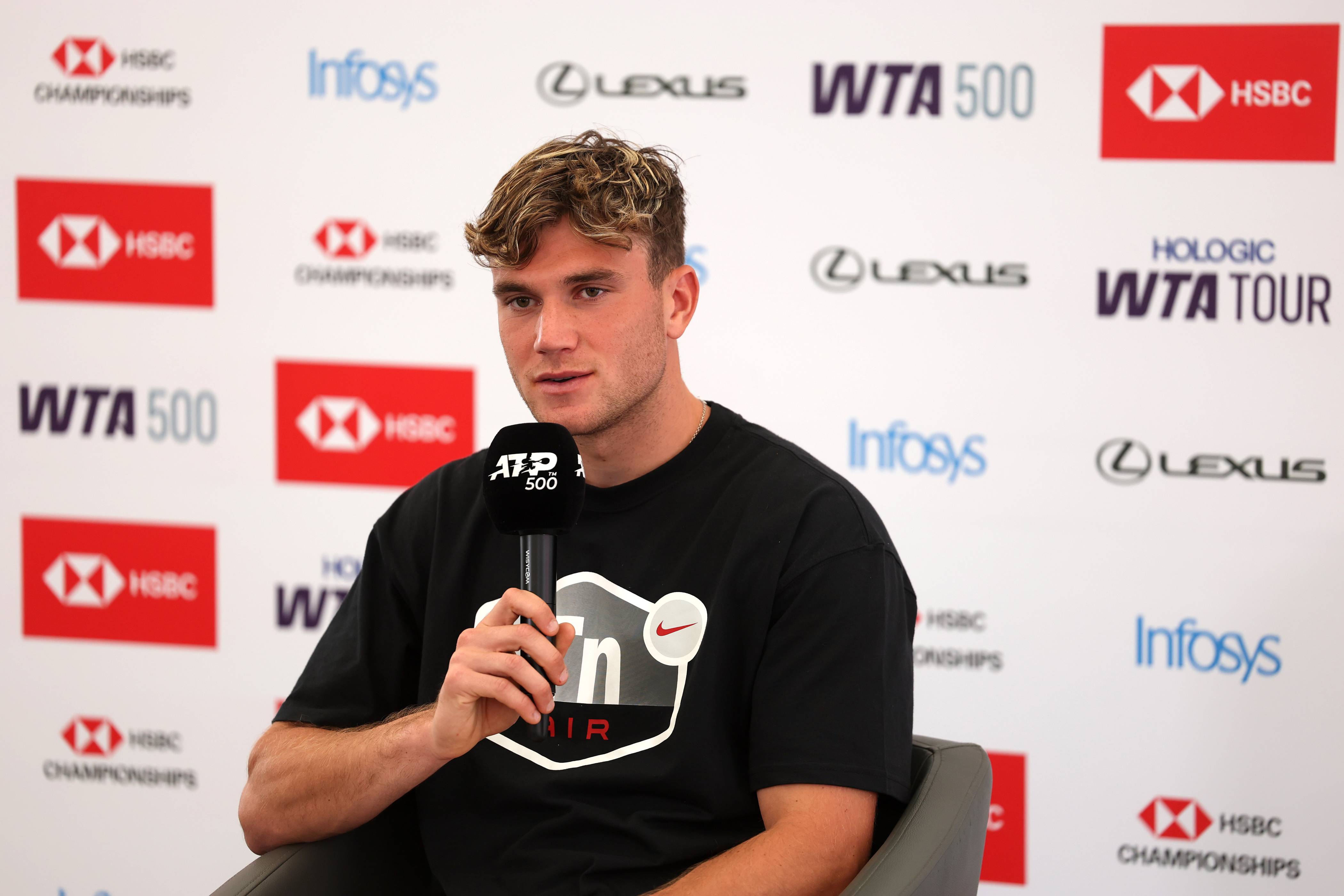 British No.1 Jack Draper sat in a press conference at the HSBC Championships
