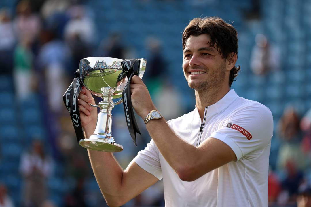 Taylor Fritz holding the Lexus Eastbourne Open trophy in 2025