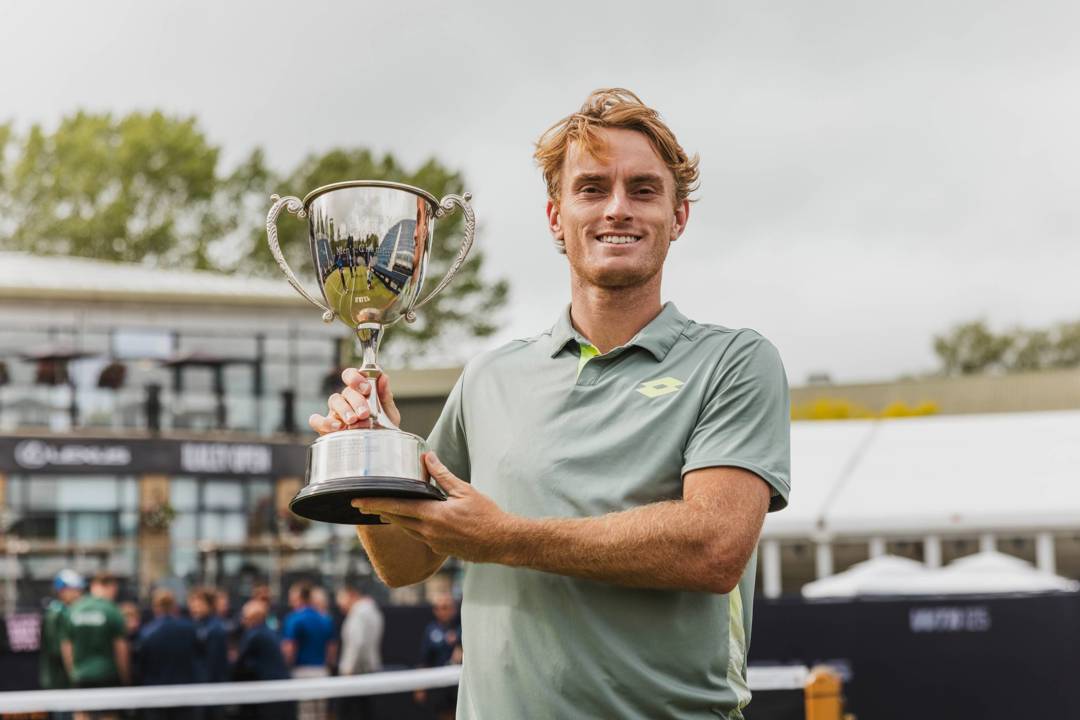 Tristan Schoolkate holding the Lexus Ilkley Open trophy