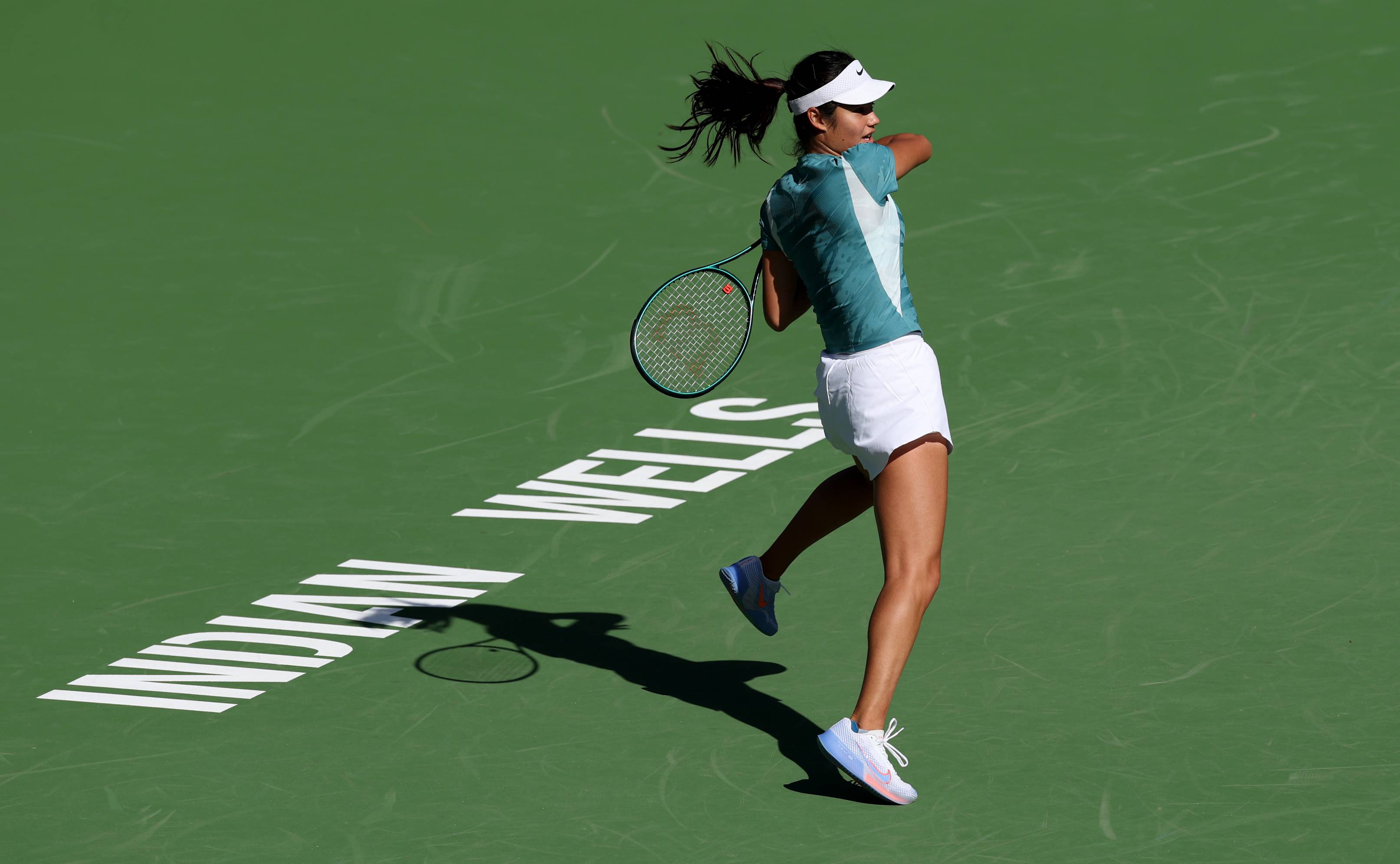 Emma Raducanu hitting a forehand in training at Indian Wells