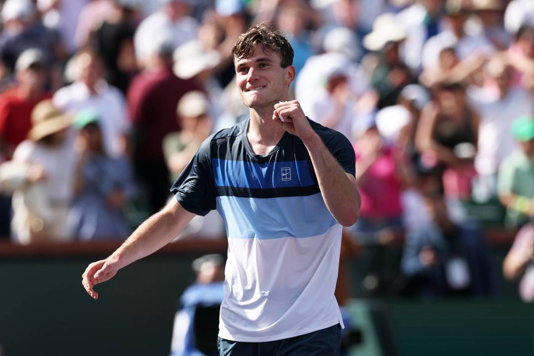 Jack Draper smiling and giving a fist pump after winning the Indian Wells title in 2025