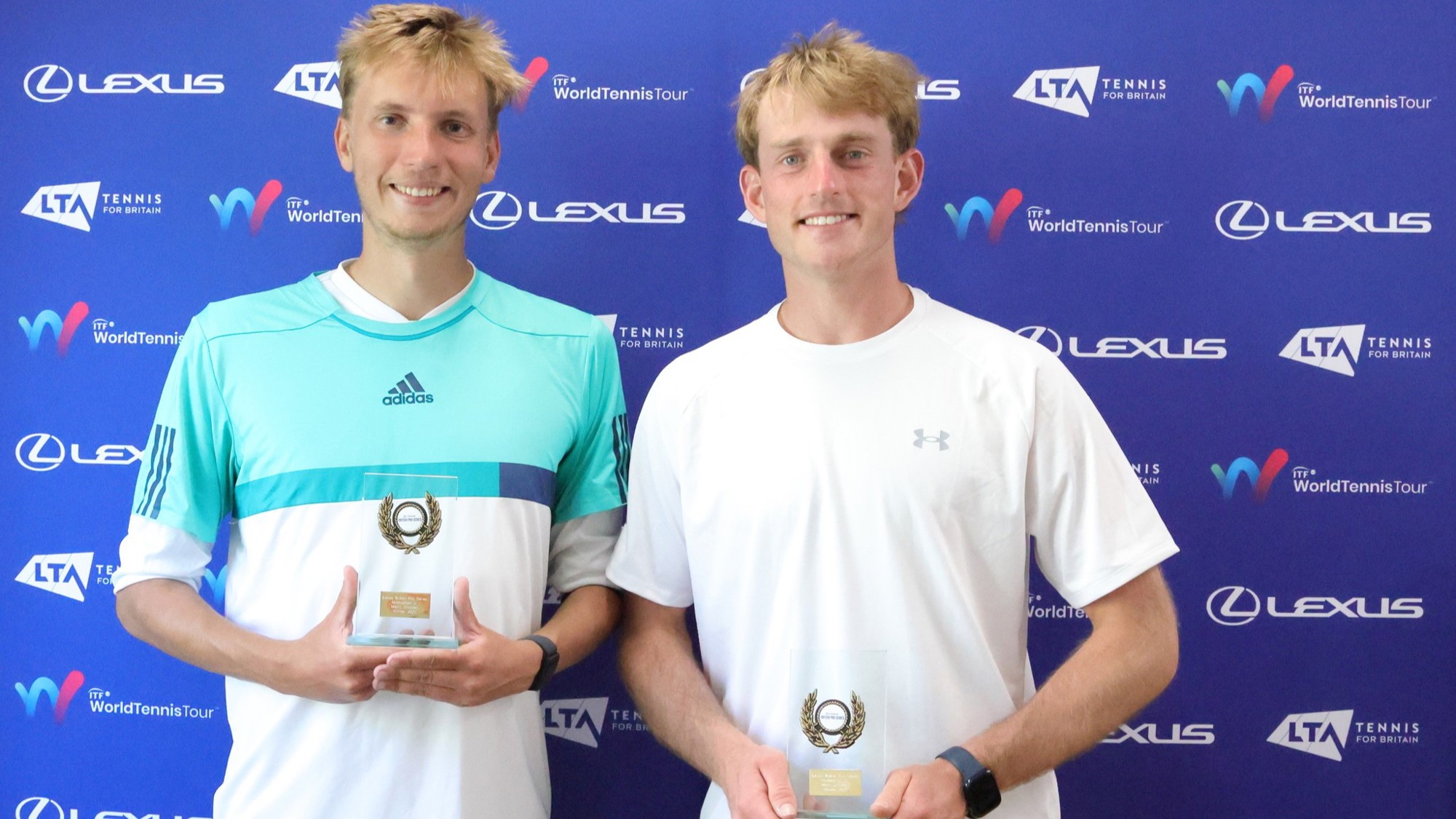 James MacKinlay and Liam Hignett holding their winners trophy at the Lexus British Pro Series Nottingham