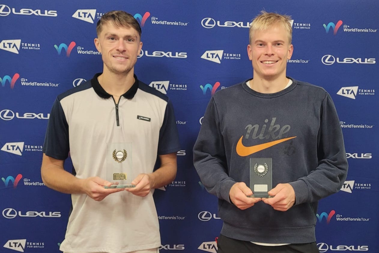 James Story holding the Lexus British Pro Series title next to runner-up Anton Matusevich