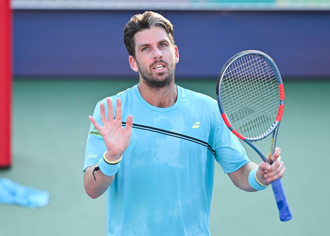 Cam Norrie waves to the crowd after reaching the fourth round of the National Bank Open