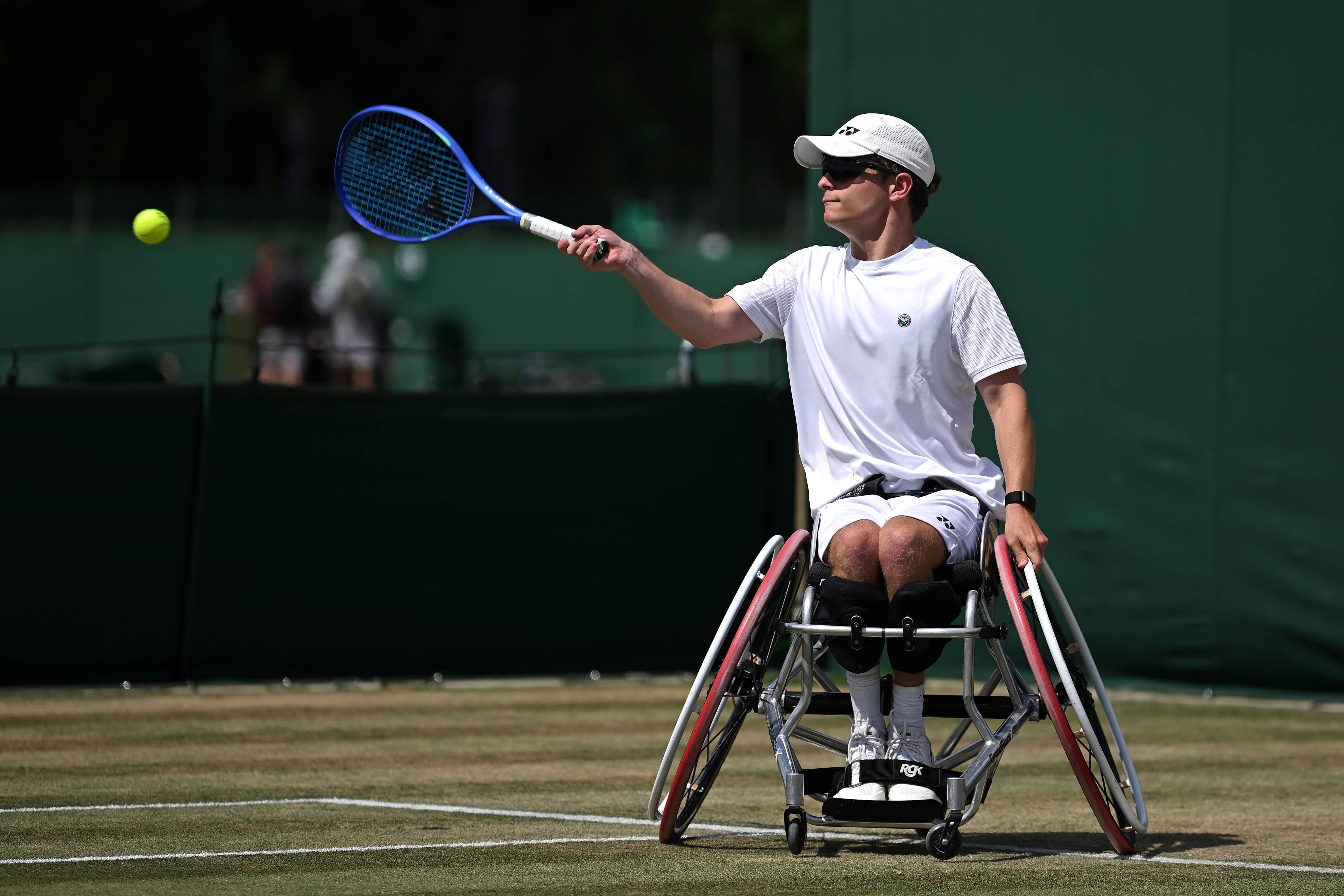 Greg Slade hits a forehand at Wimbledon