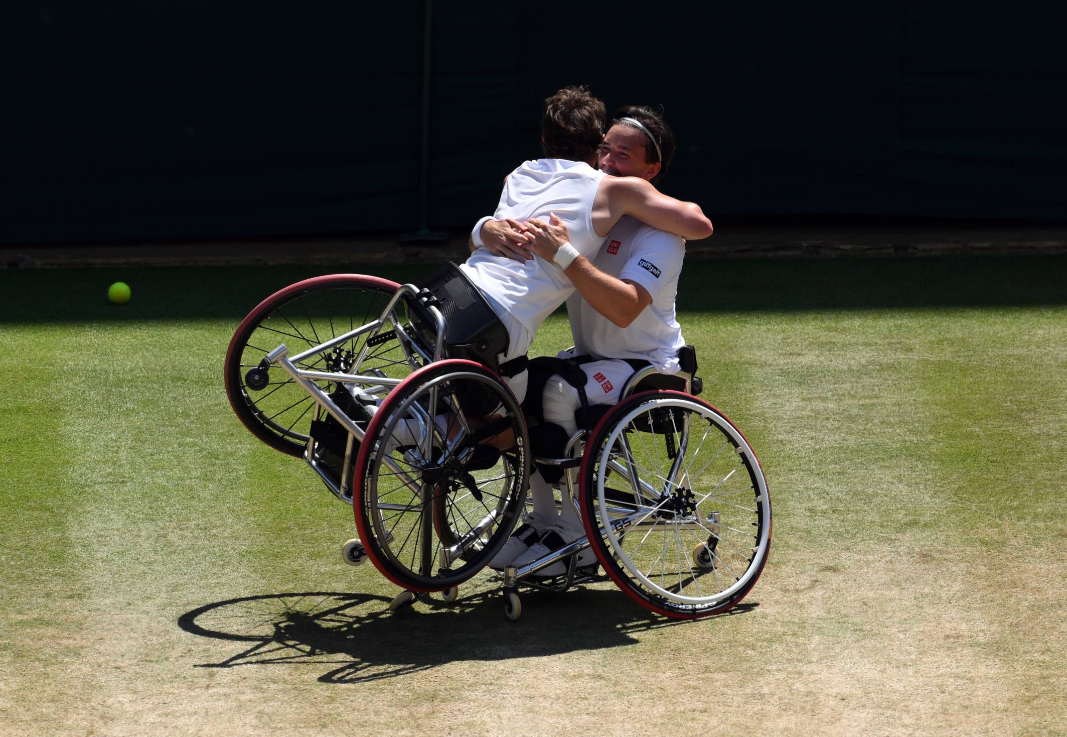 Alfie Hewett hugs Gordon Reid after winning their seventh Wimbledon doubles title in 2026