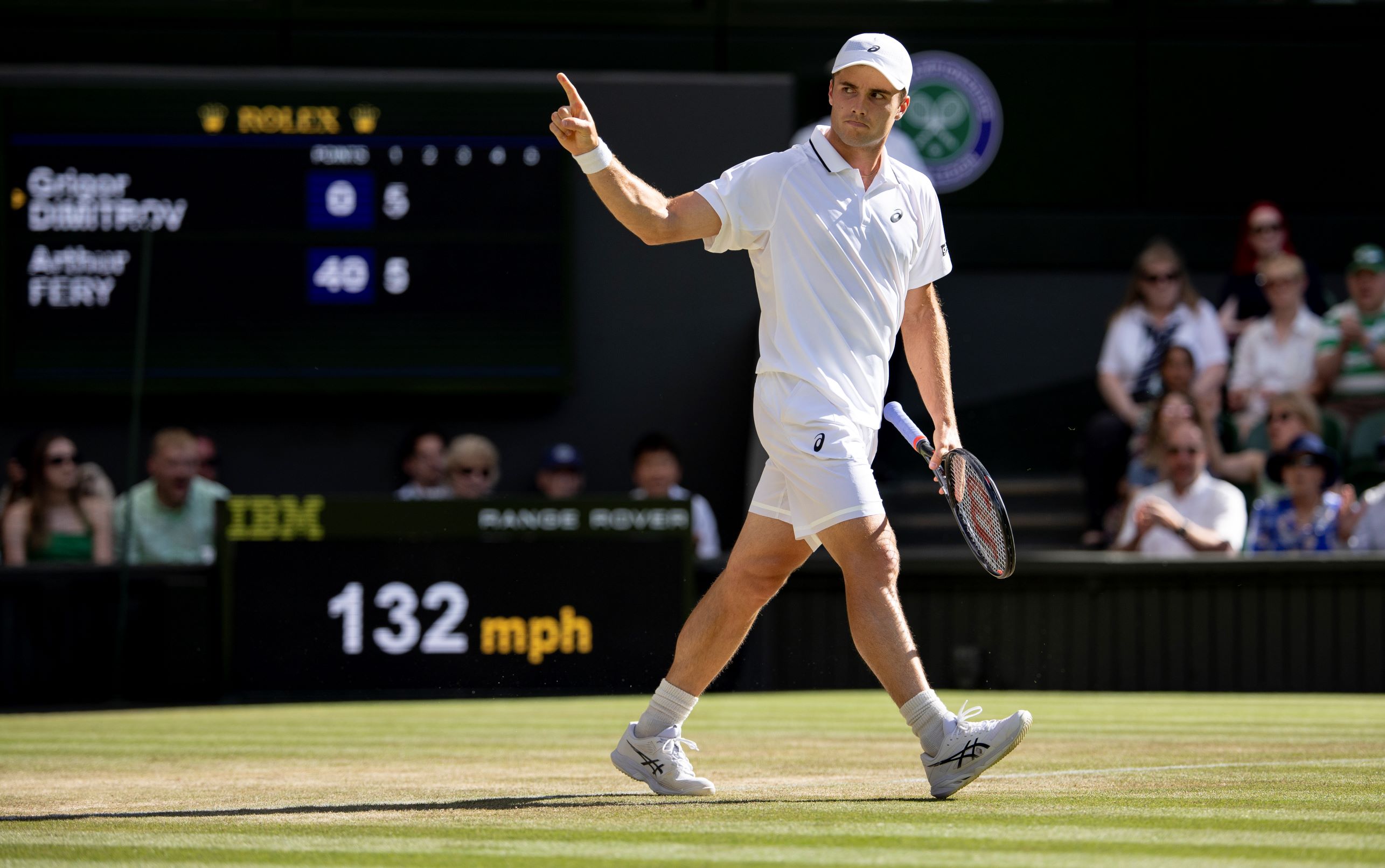 Arthur Fery raises his finger, pointing to his box in celebration on Centre Court at Wimbledon