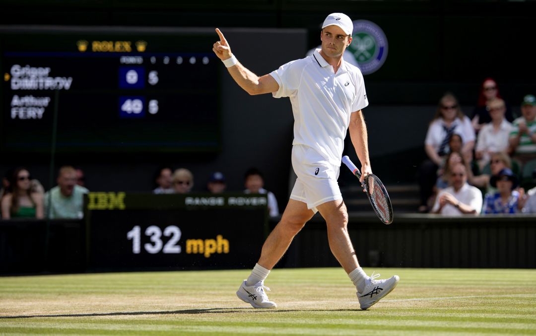 Arthur Fery raises his finger, pointing to his box in celebration on Centre Court at Wimbledon