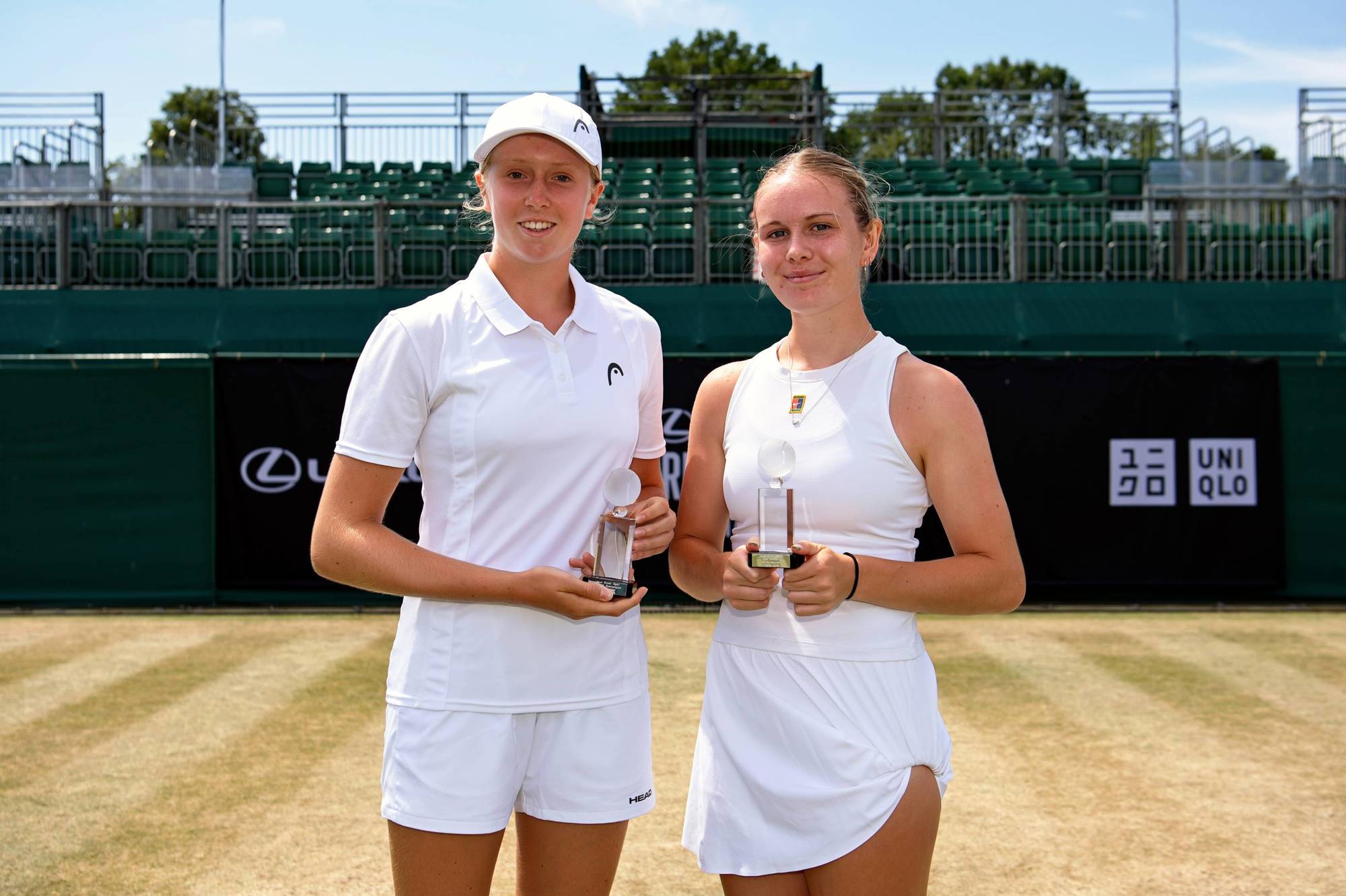 British runners-up Daniella Britton and Edie Griffiths holding their trophies at the Lexus British Open Roehampton 