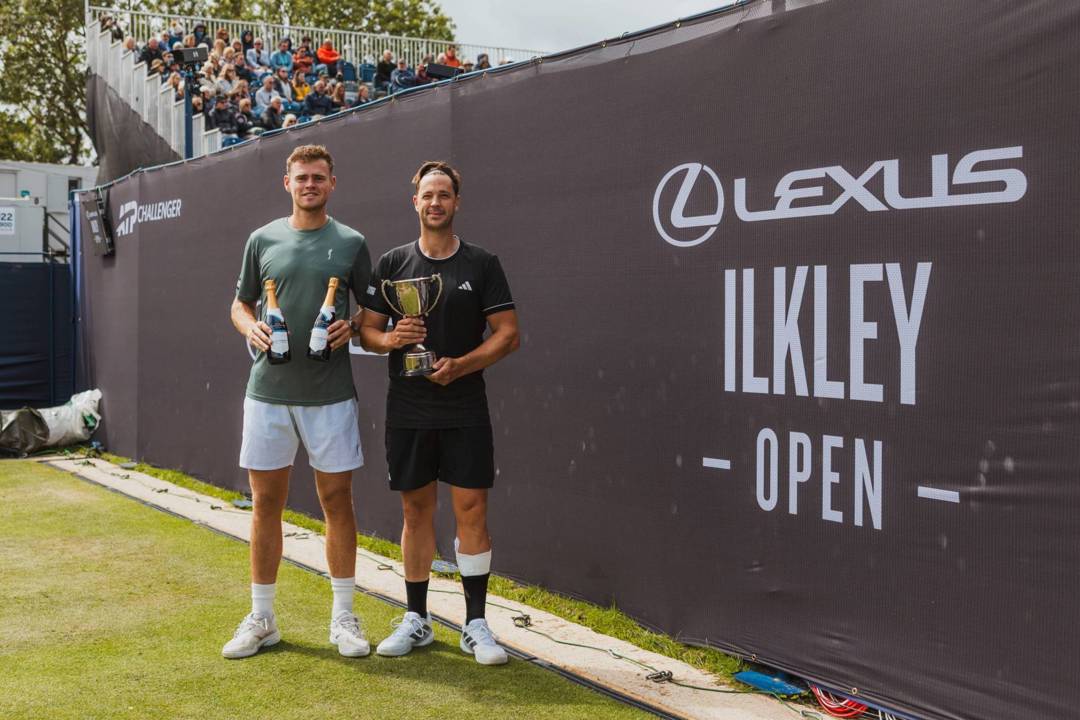 Marcus Willis and David Stevenson holding their trophies at the Lexus Ilkley Open 