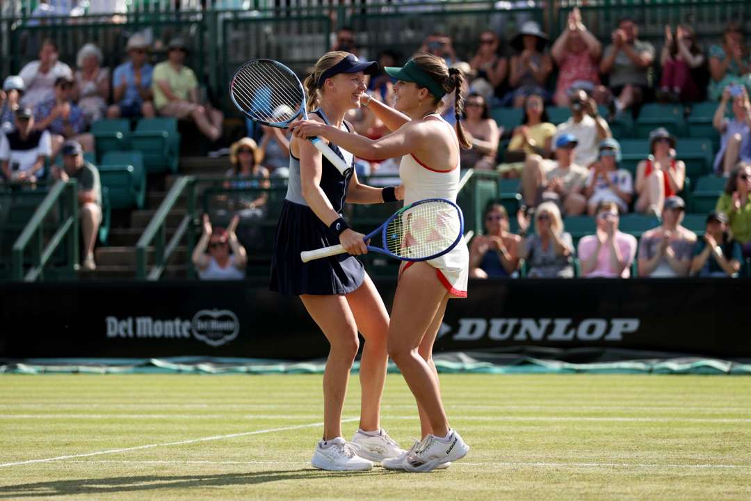 Harriet Dart and Maia Lumsden hugging on court at the Lexus Nottingham Open