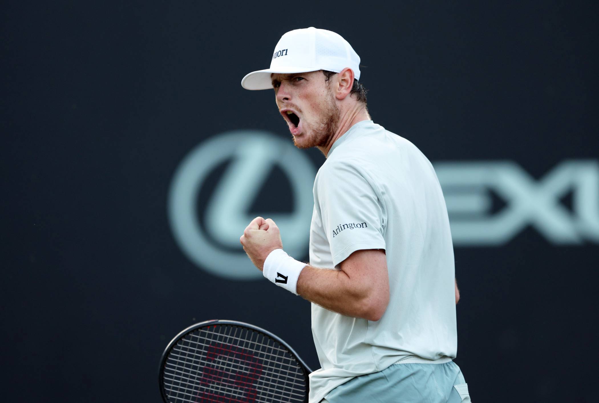 Jack Pinnington Jones celebrates winning a point at the Lexus Birmingham Open