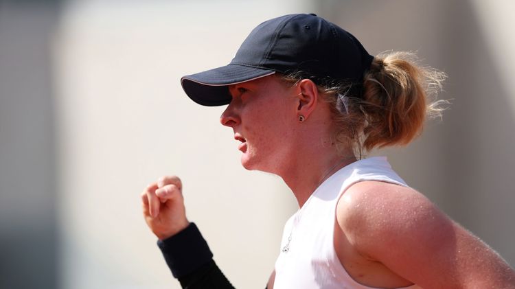 British tennis player Francesca Jones pumps her fist in celebration