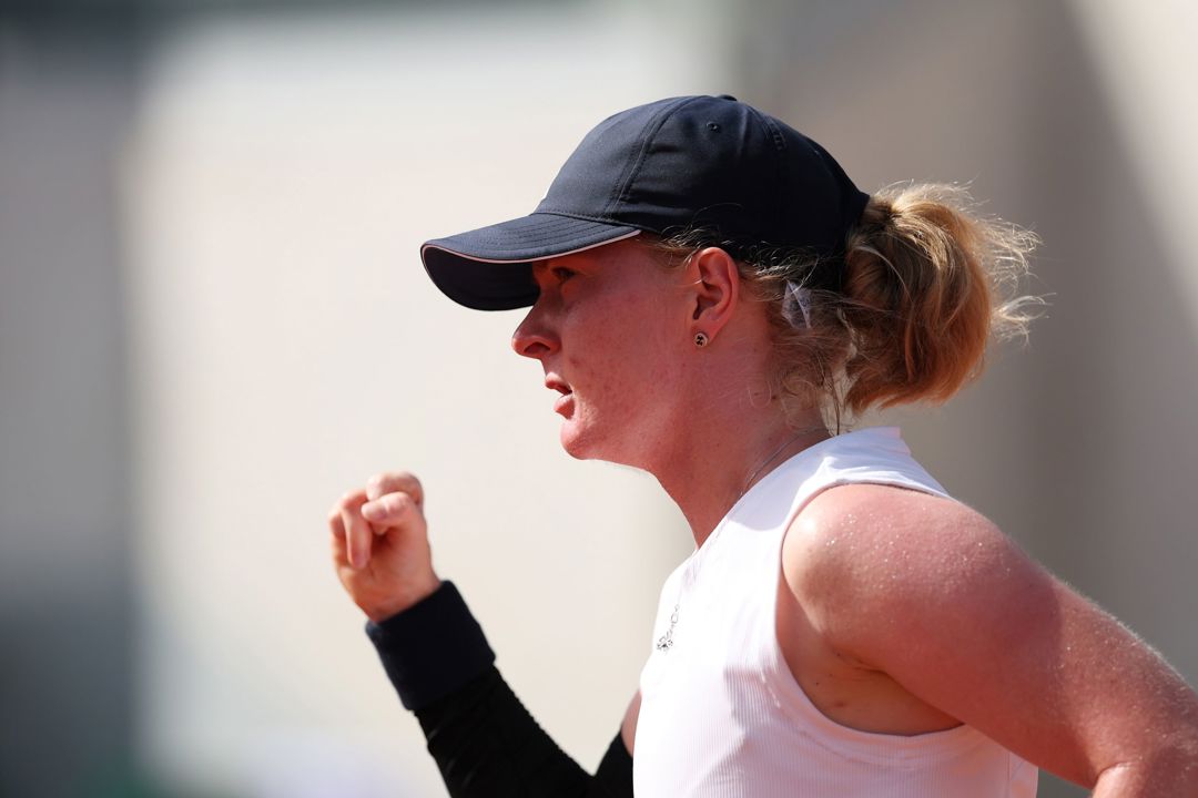 British tennis player Francesca Jones pumps her fist in celebration