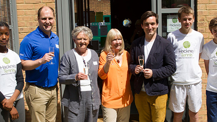 Group pose for a picture at the Hackney pavilion opening