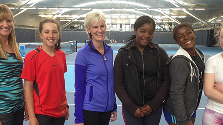 Judy Murray smiling with five junior tennis players