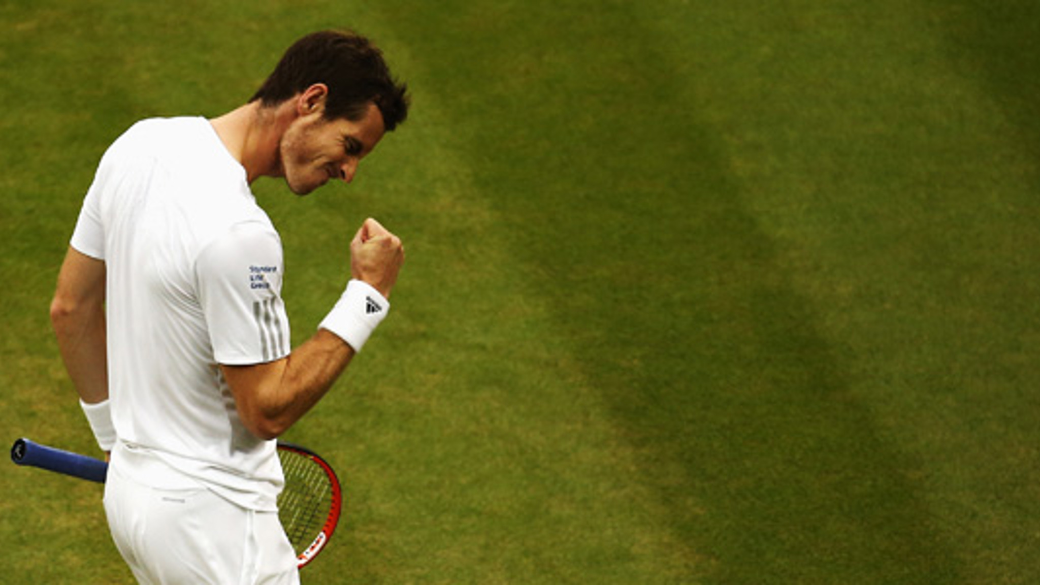 Andy Murray fist pumping at Wimbledon