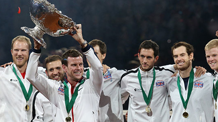 The 2015 Davis Cup team celebrate with their trophy in the air