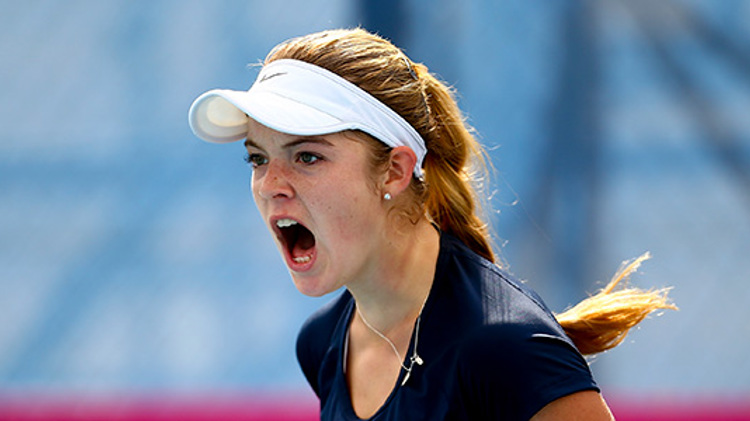 Katie Swan roaring with a nike cap on