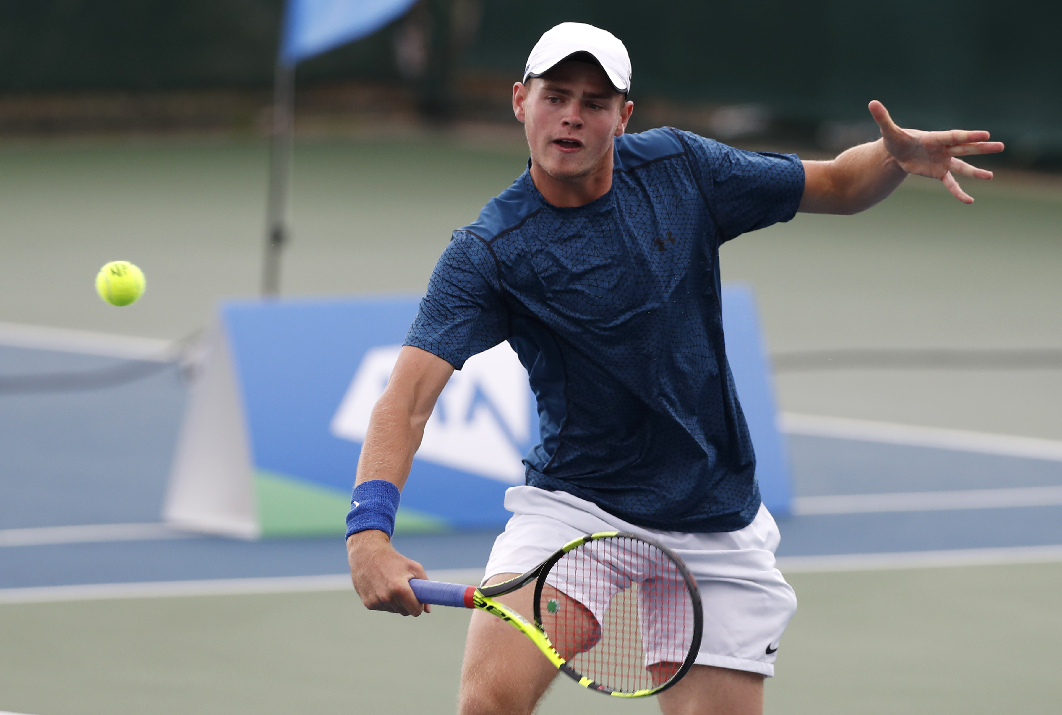 David Stevenson hitting a backhand