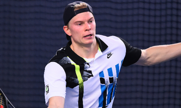 Anton Matusevich in action about to take a forehand shot