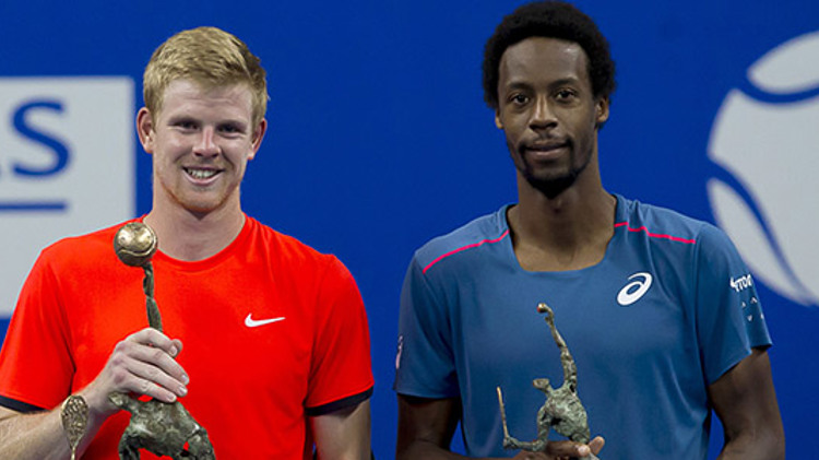 Kyle Edmund holding winning trophy next to Gael Monfils in Antwerp