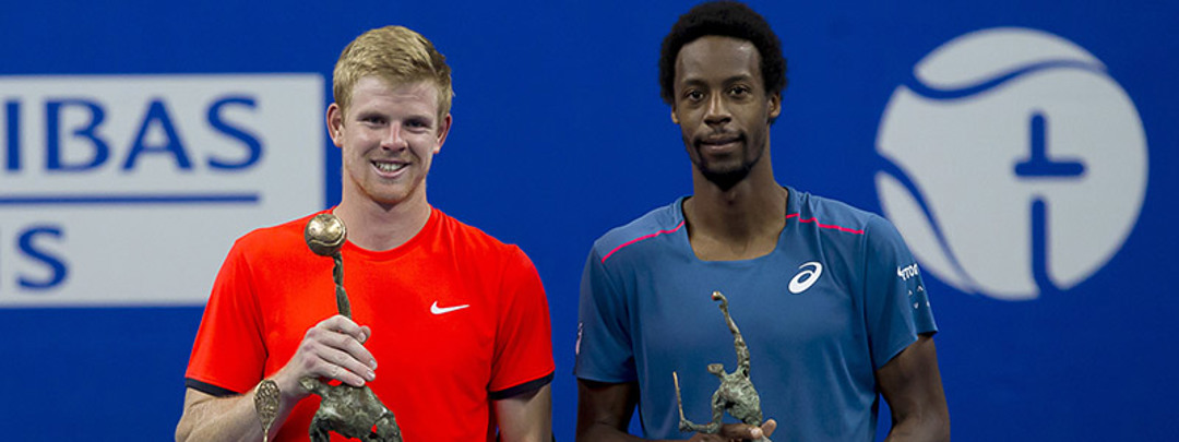 Kyle Edmund holding winning trophy next to Gael Monfils in Antwerp