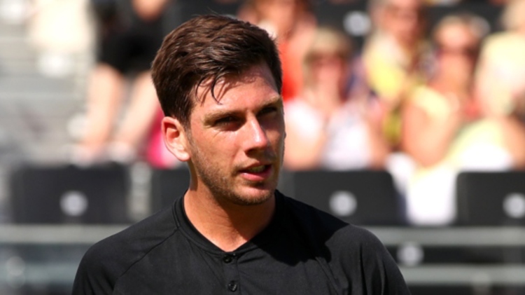 Cameron Norrie with crowd behind