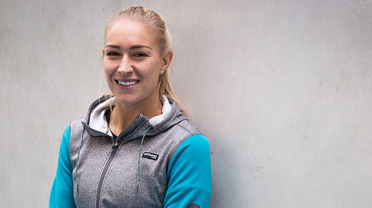 header image of jocely rae smiling wearing blue and grey sweater