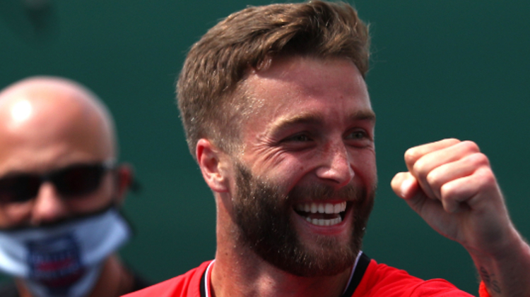 Liam Broady fist pump after a tennis point at the Battle of the Brits