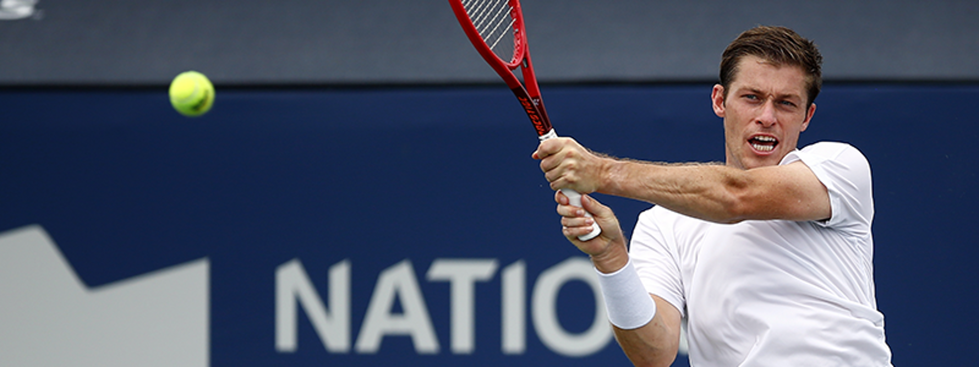 Neal Skupski playing at backhand at the US Open