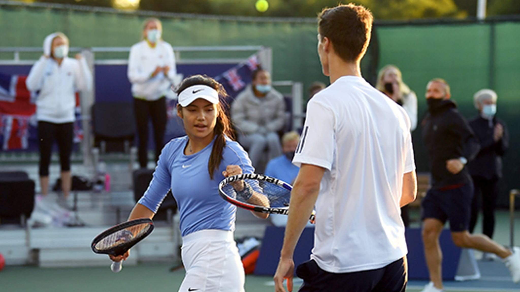 Emma Radicanu on the court with Joe Sailsbury