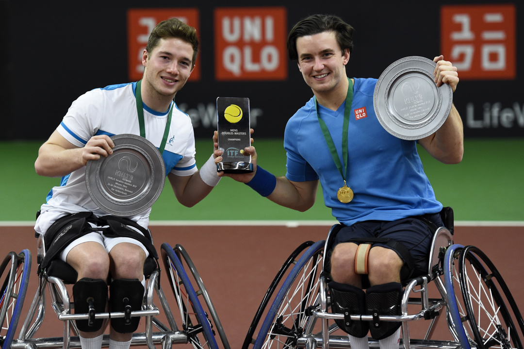 Alfie Hewett and Gordon Reid pose with their Doubles Masters trophies in 2017
